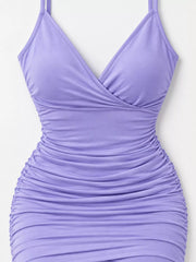 Front view of a lavender ruched bodycon mini dress on a mannequin, highlighting the fitted shape.