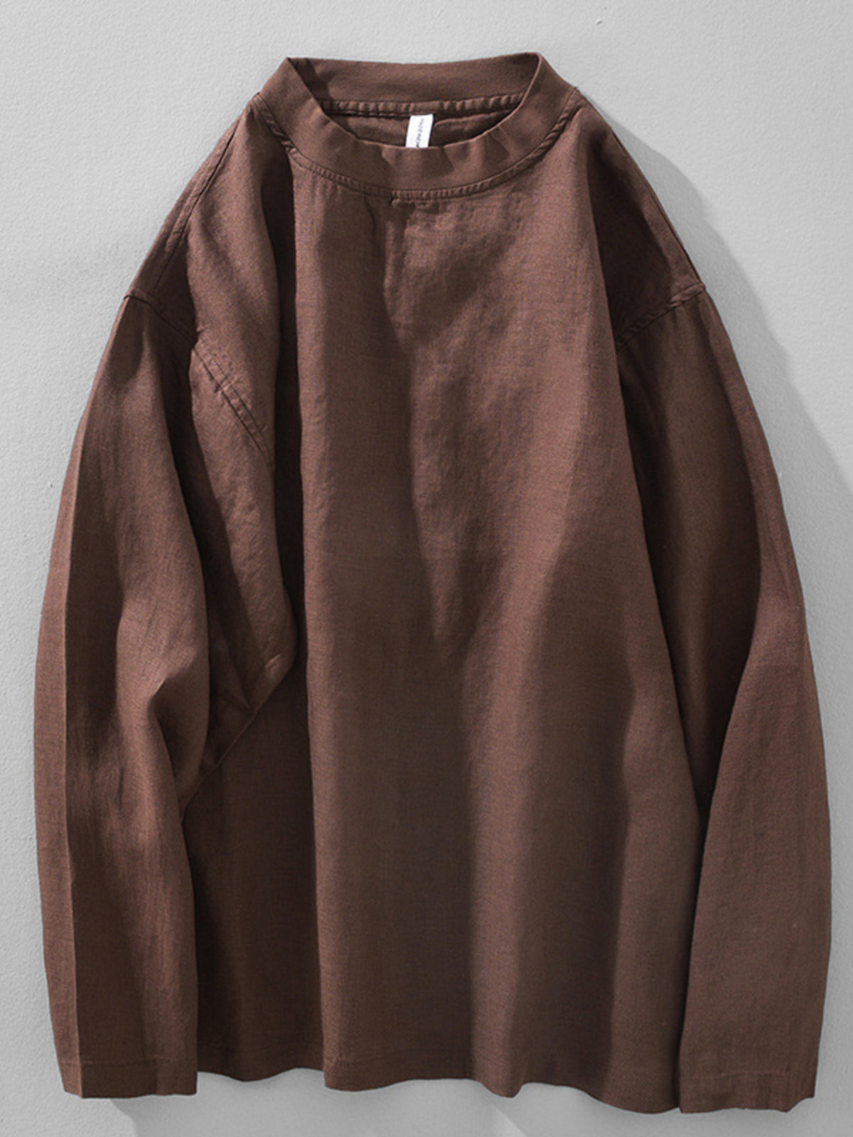 Brown long-sleeve crewneck T-shirt, front view