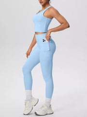 Light blue tank and leggings in side view with phone in pocket