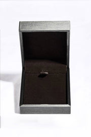 Open grey jewellery box with a dark lined interior