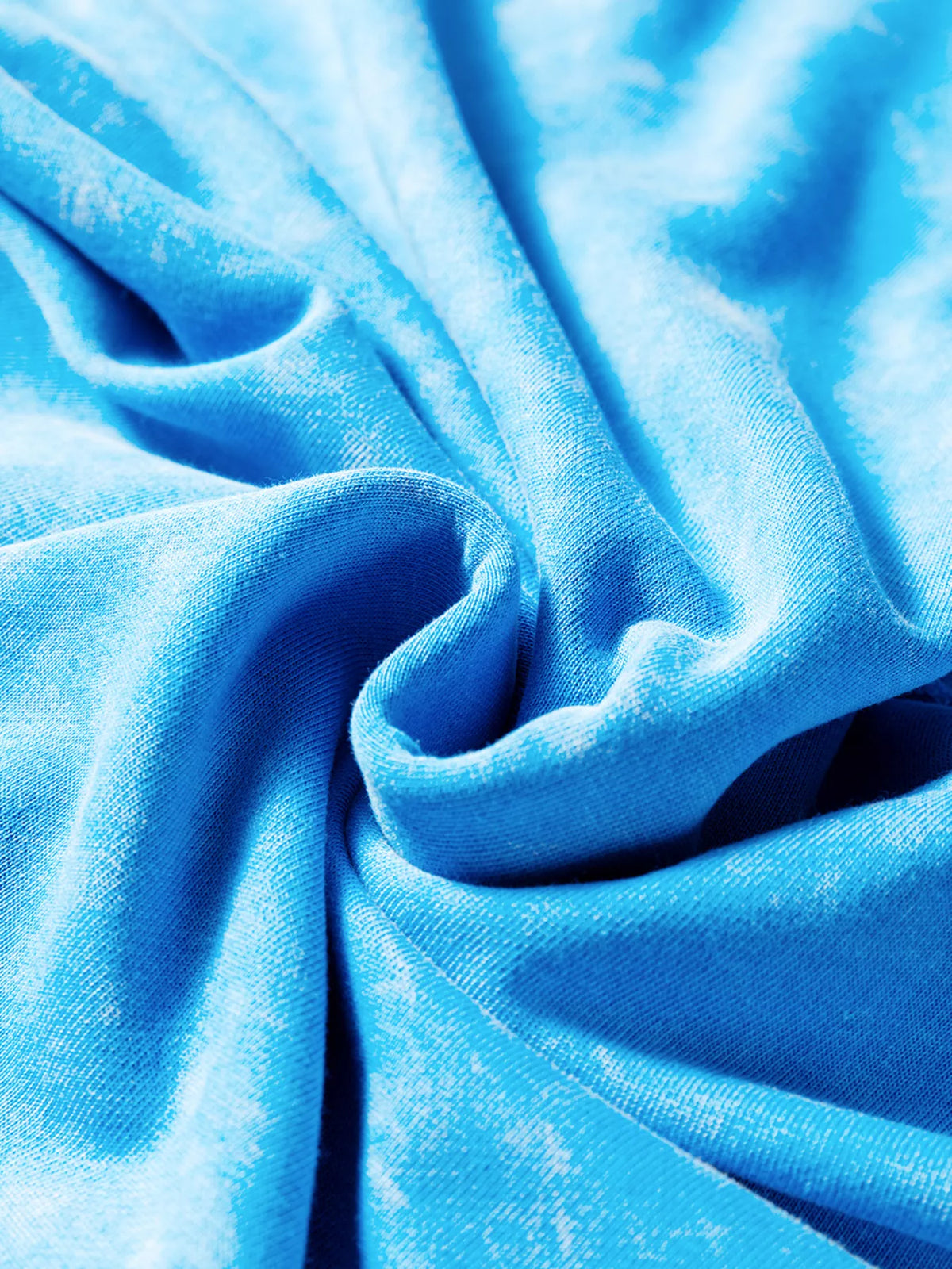 Women's mineral-wash blue raw-seam pocket sweatshirt, close-up of blue mineral-wash fabric