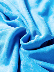 Women's mineral-wash blue raw-seam pocket sweatshirt, close-up of blue mineral-wash fabric