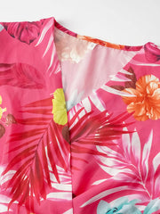 Close-up of tropical print belt and buckle