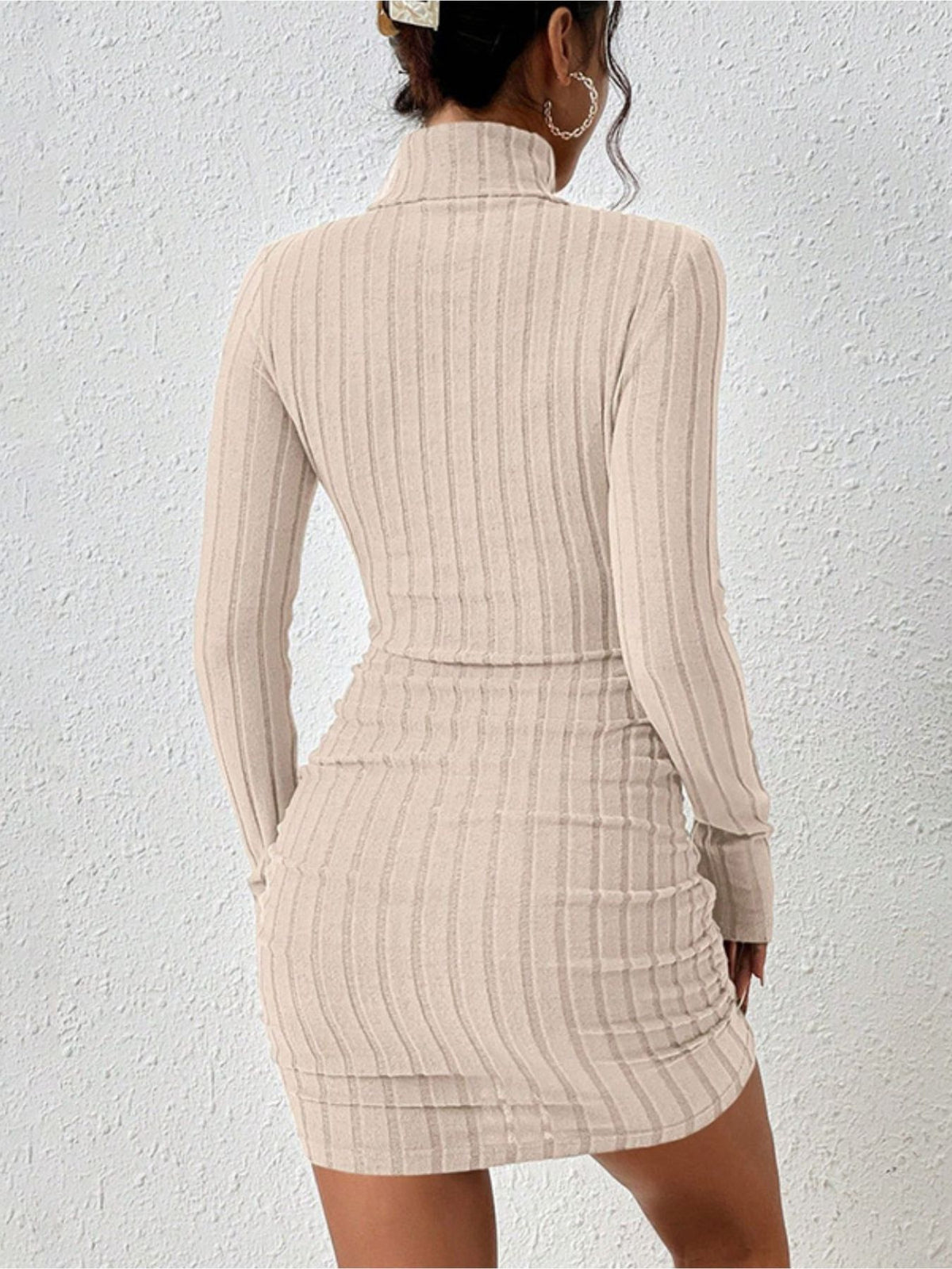 Back view of beige ribbed dress