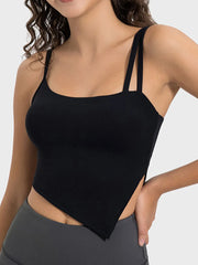 Close view of the peach cami neckline and shoulder straps