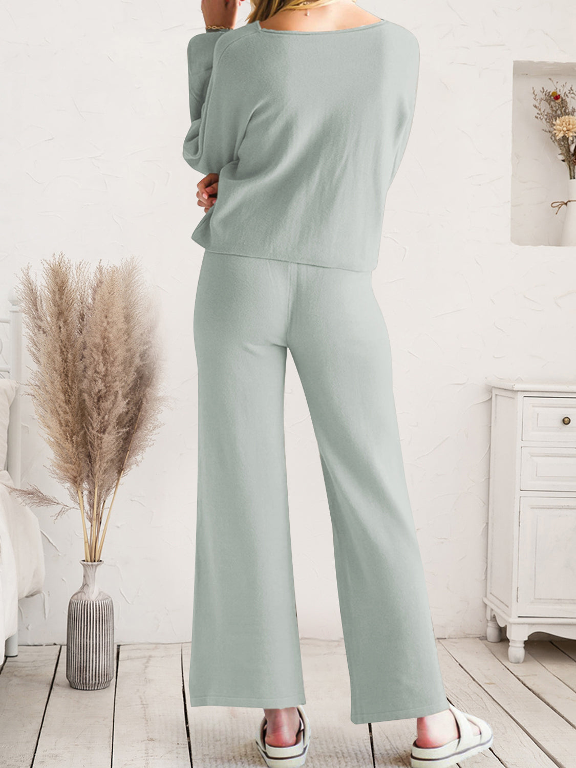 Light gray wide-leg lounge pants shown from waist to hem