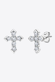 Pair of silver-tone cross stud earrings covered in small clear stones, shown front and side