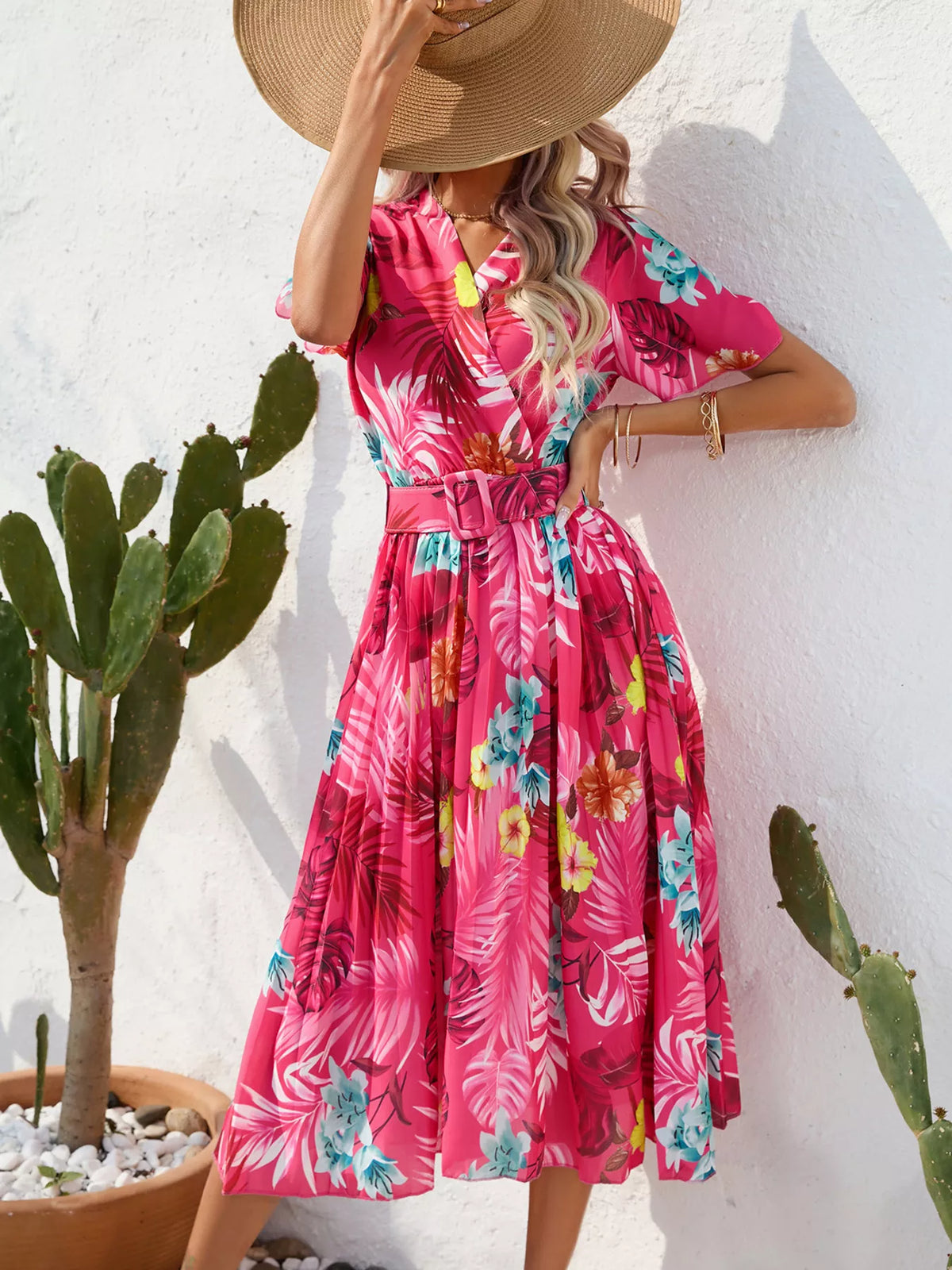 Hot pink tropical print pleated belted midi dress, front view