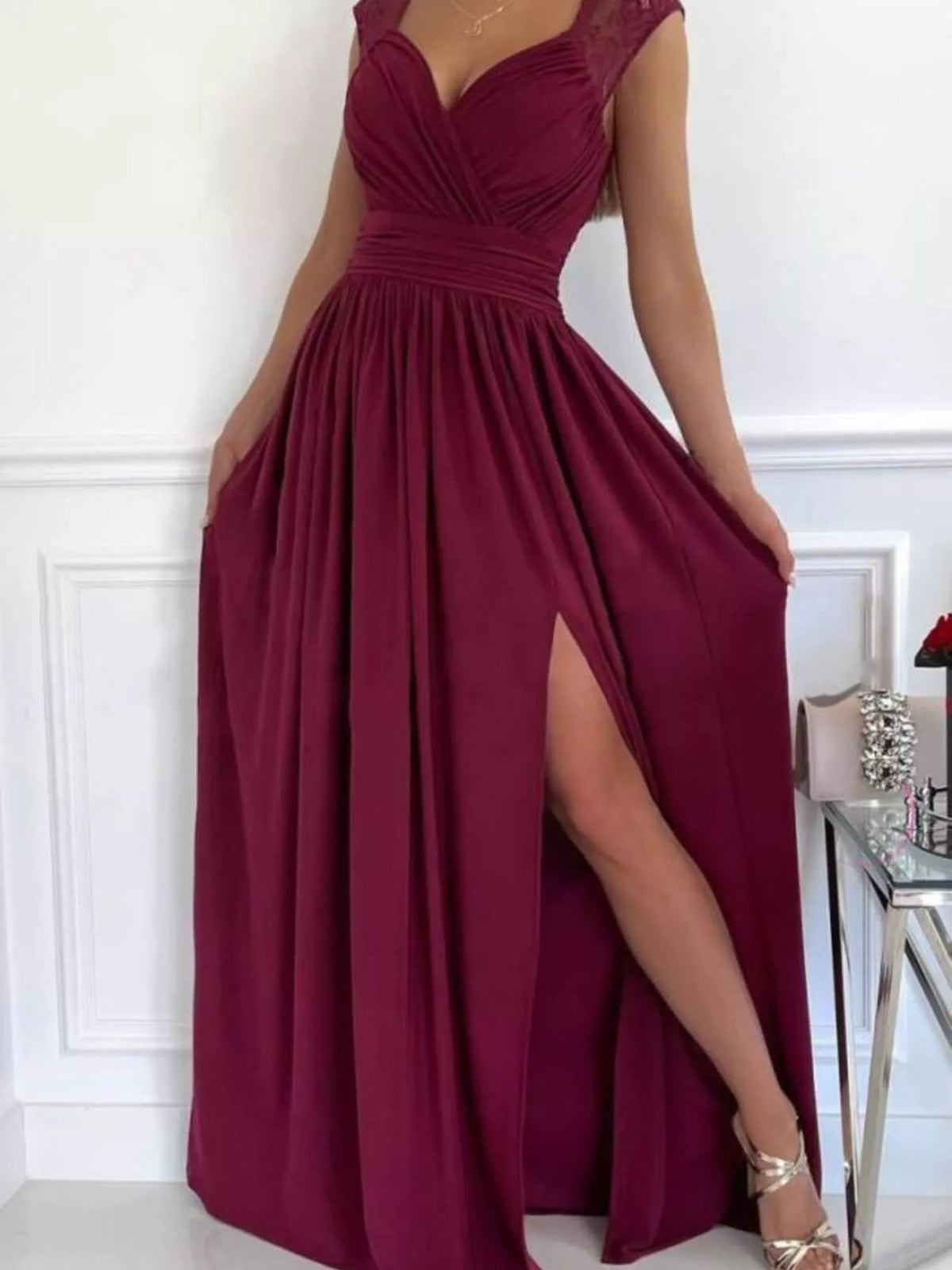 Burgundy maxi dress with lace shoulder detail and high front slit