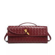 Burgundy woven flap crossbody bag with gold-tone turn-lock clasp