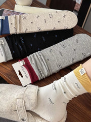 Printed crew socks arranged in a row