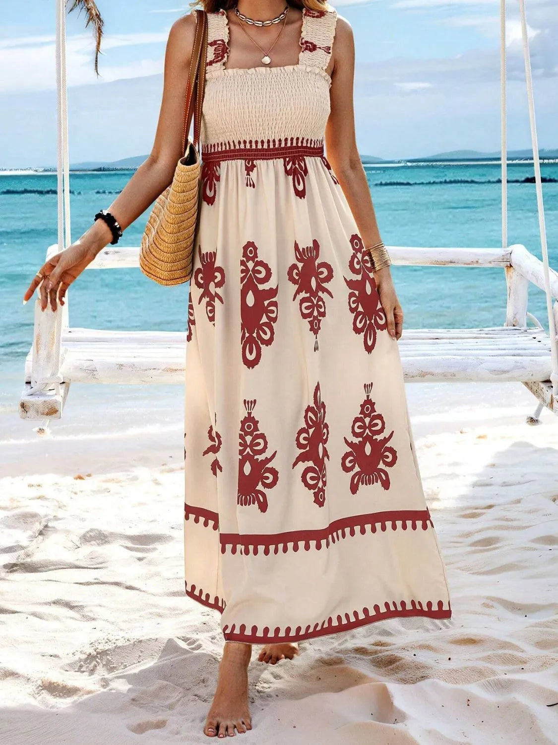 Full-length view of cream dress with burgundy print and smocked bodice