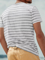 Back view of gray-and-white striped T-shirt