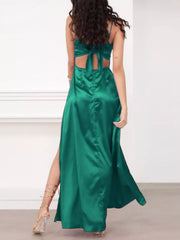 Rear view of green maxi dress showing open back and tied strap detail