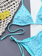 Pink leopard bikini set arranged with bright pink cups