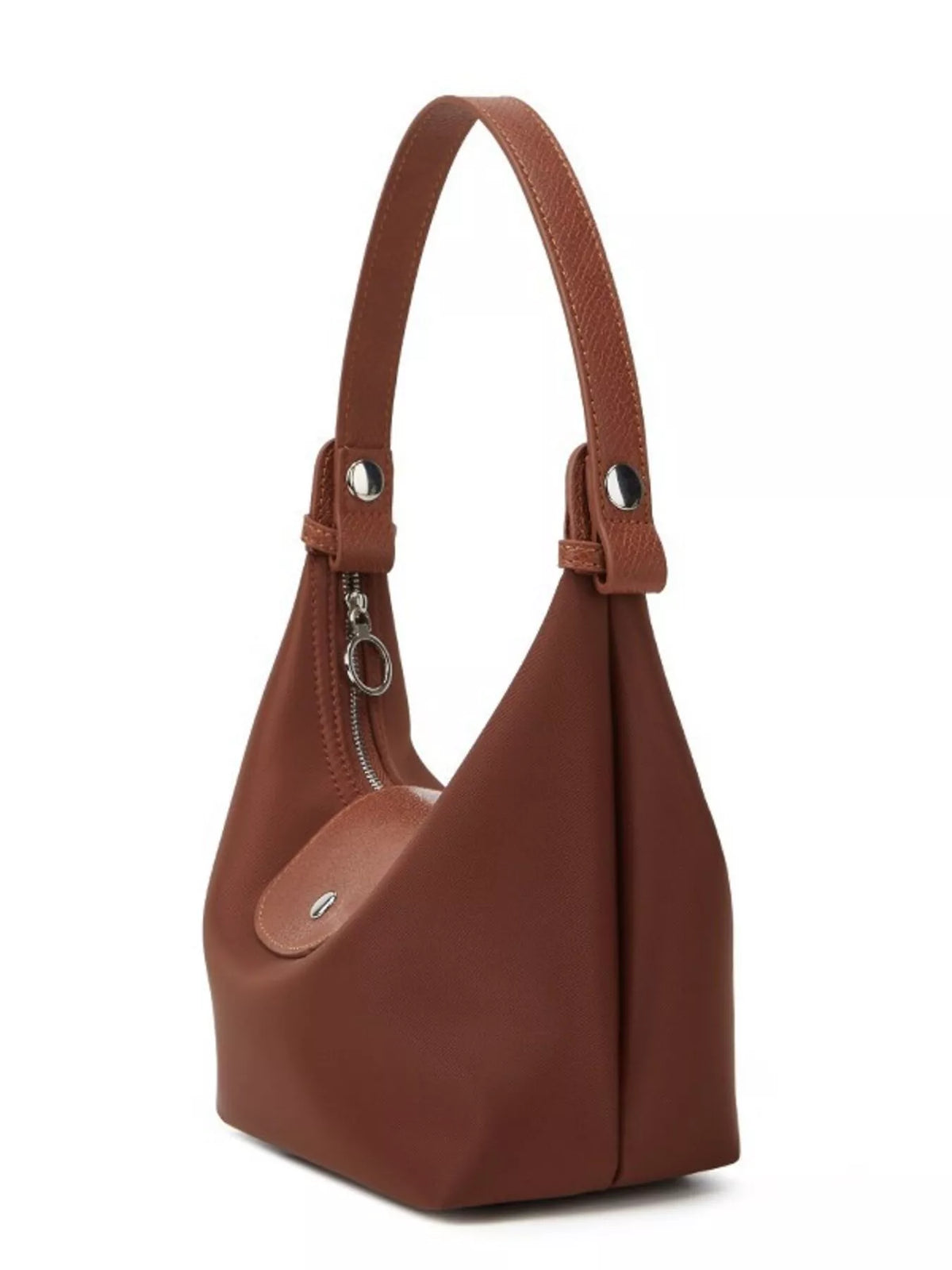Side profile of the brown shoulder bag showing its deep gusset and short handle.