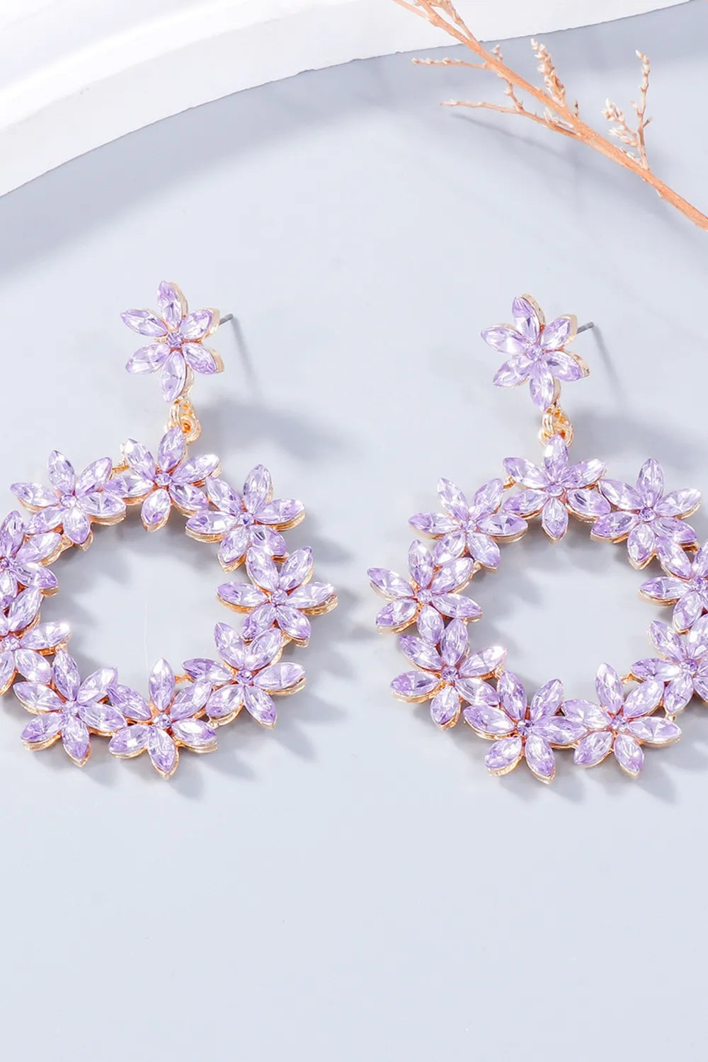 Pair of pale pink rhinestone flower dangle earrings