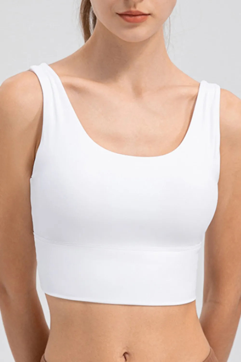 White cropped tank with scoop neckline and wide straps, front view