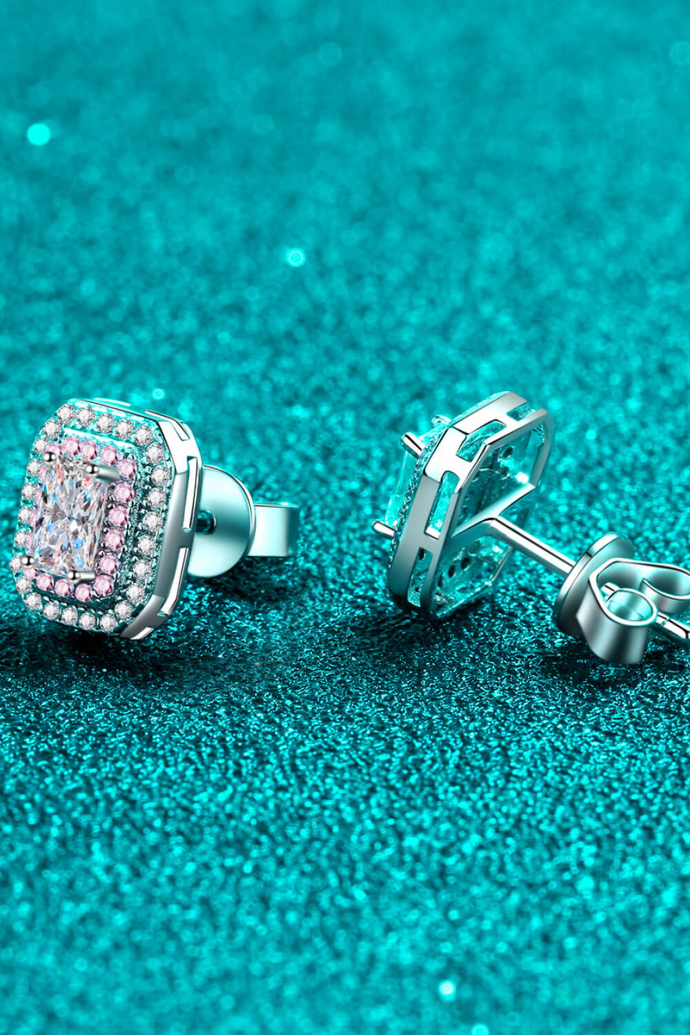 Rectangular pink-bordered stud earrings showing the front setting and rear post