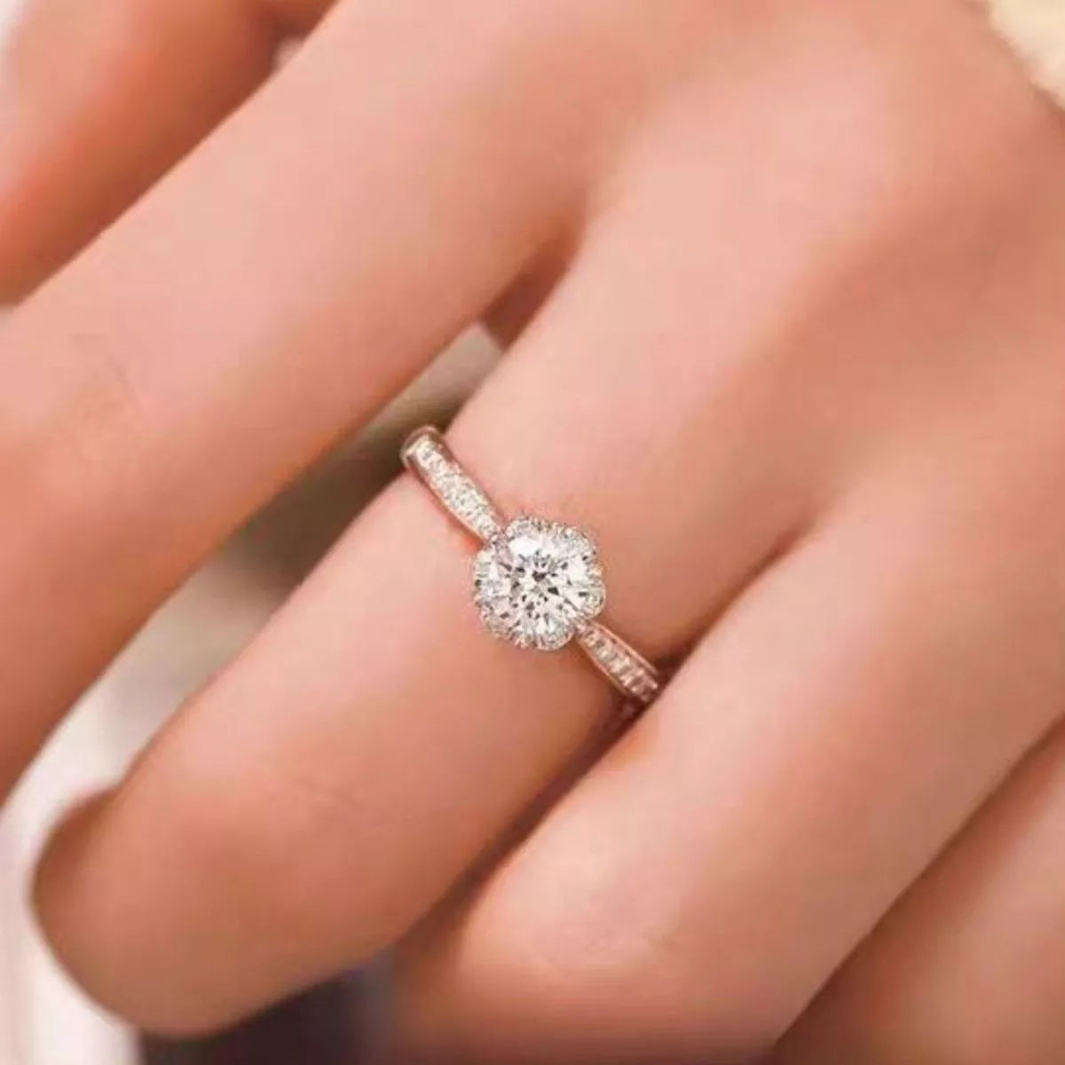 Sterling silver moissanite ring shown from above on a hand