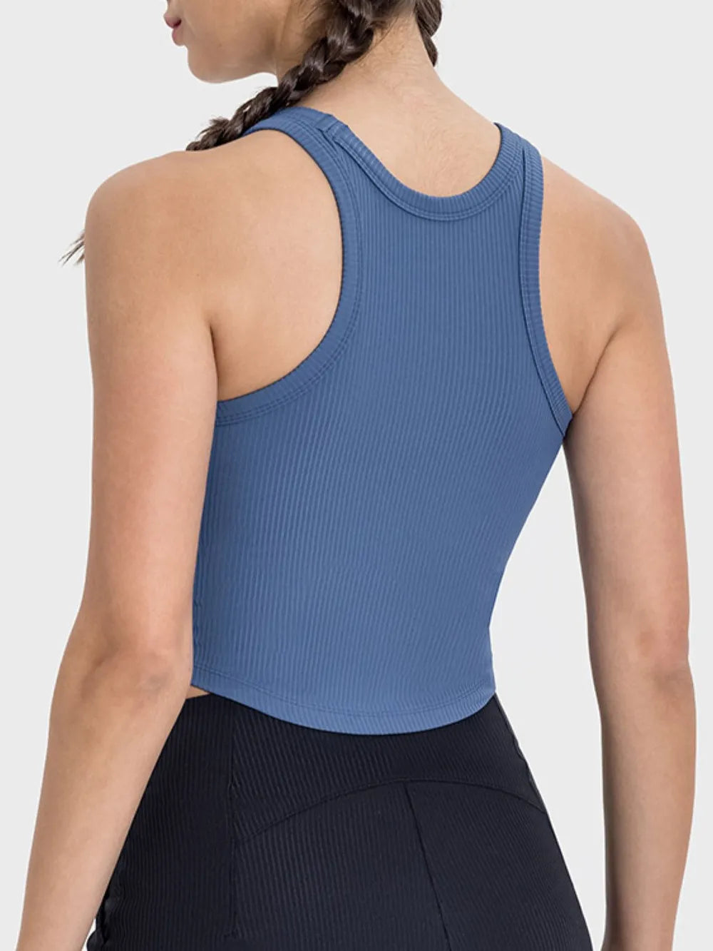 Back view showing the racerback cut of the blue cropped tank top