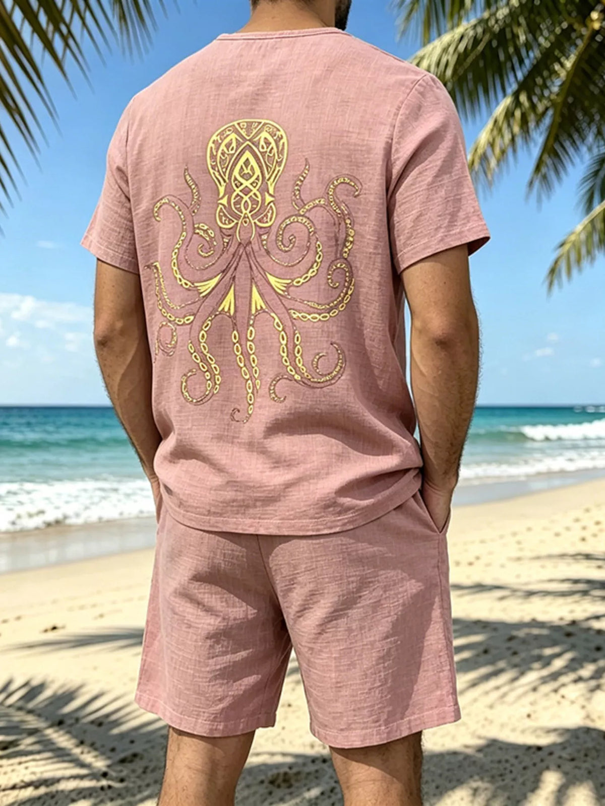 Pink tee and shorts set shown from the back with the octopus graphic on the shirt.