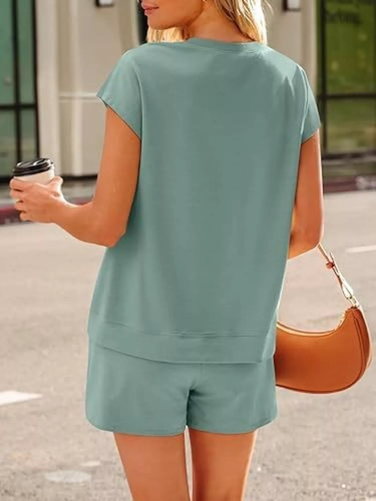 Back view of the teal top and shorts set.