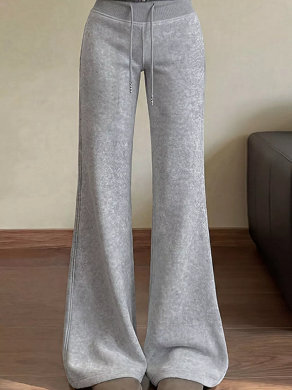 Grey drawstring wide-leg flare pants with a high elastic waist, front view