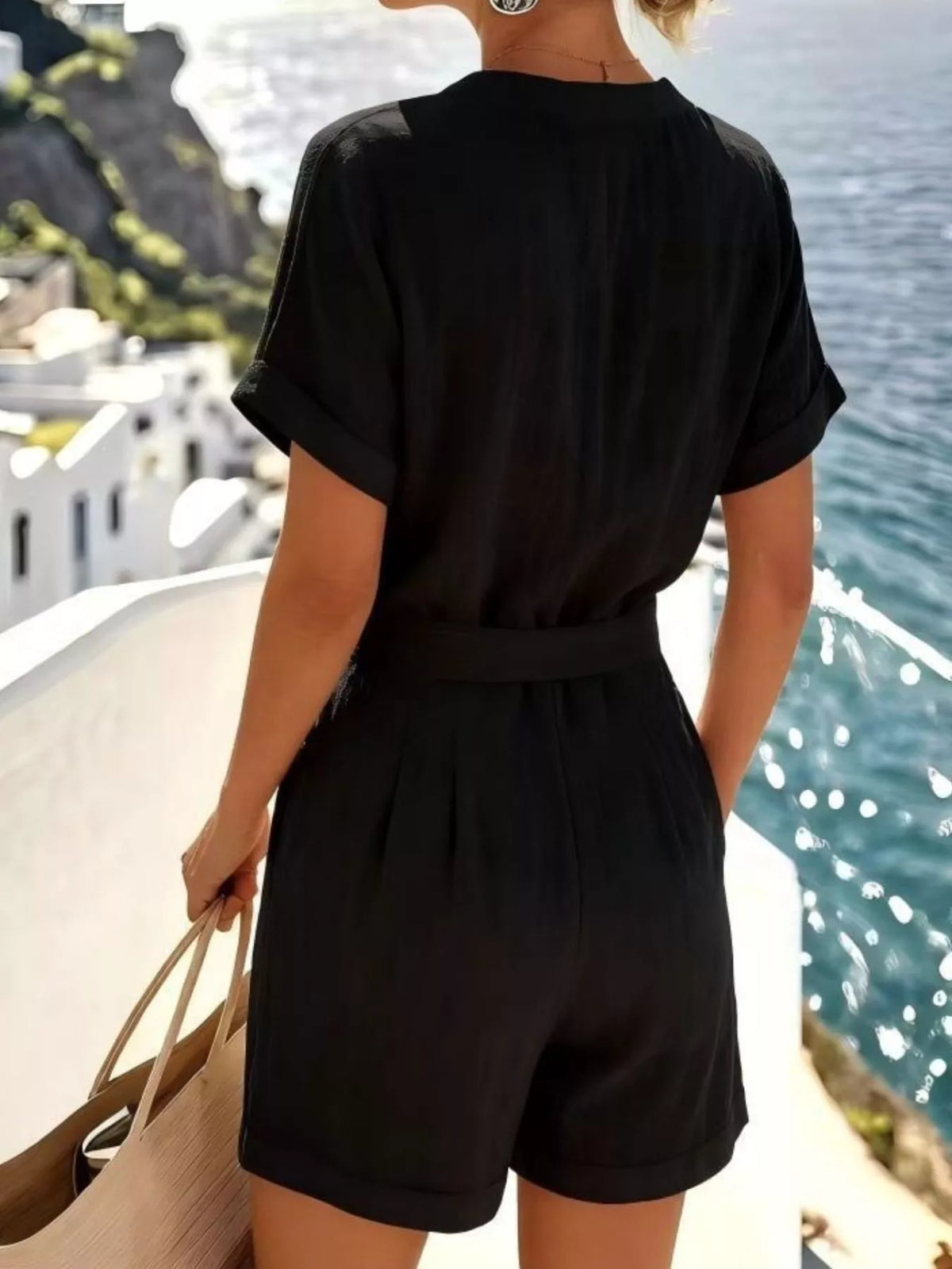 Back view of the black shirt and matching shorts.