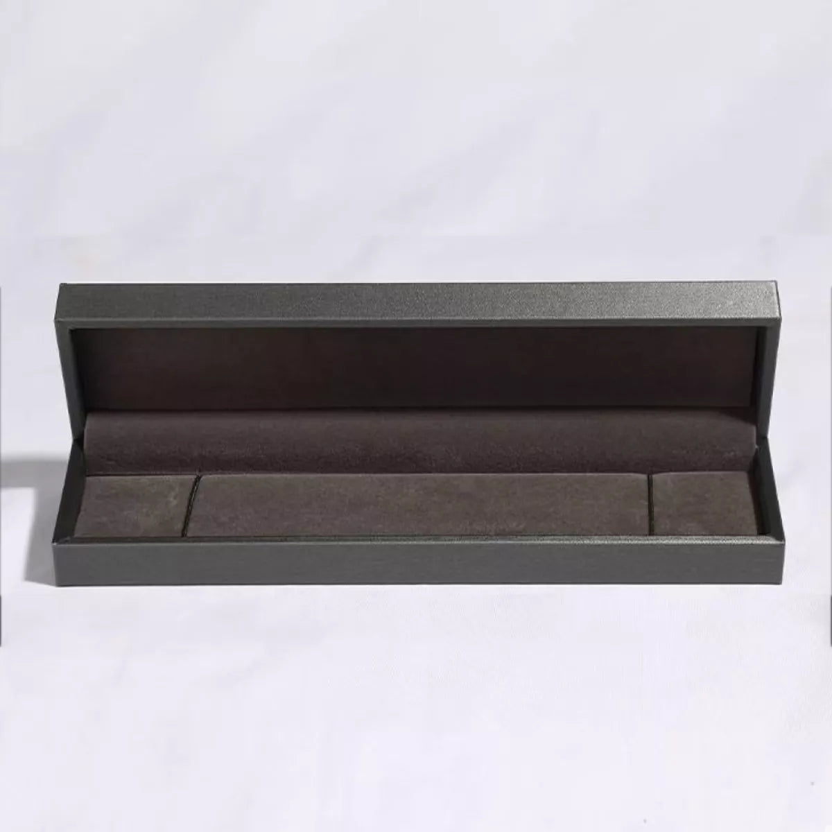 Open dark presentation box for the moissanite bracelet
