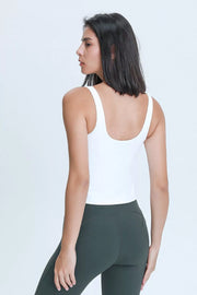 Back view of the white active tank with a low scoop back.