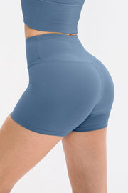 Slate-blue wide-waistband ribbed shorts, rear three-quarter view