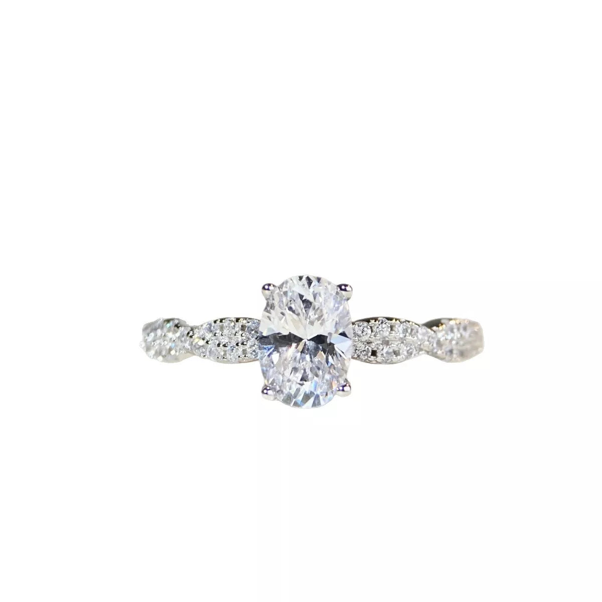 Close view of the ring band and oval stone setting