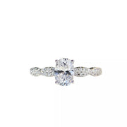 Close view of the ring band and oval stone setting