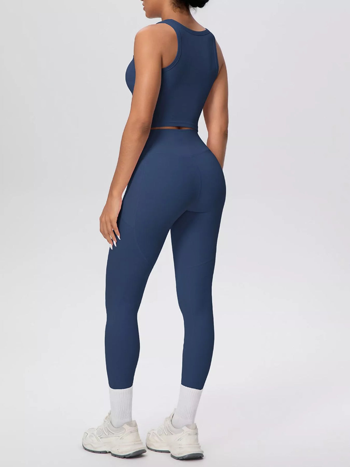 Back view of navy tank and matching leggings