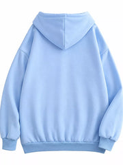 Back view of the light blue hoodie with oversized hood and ribbed hem