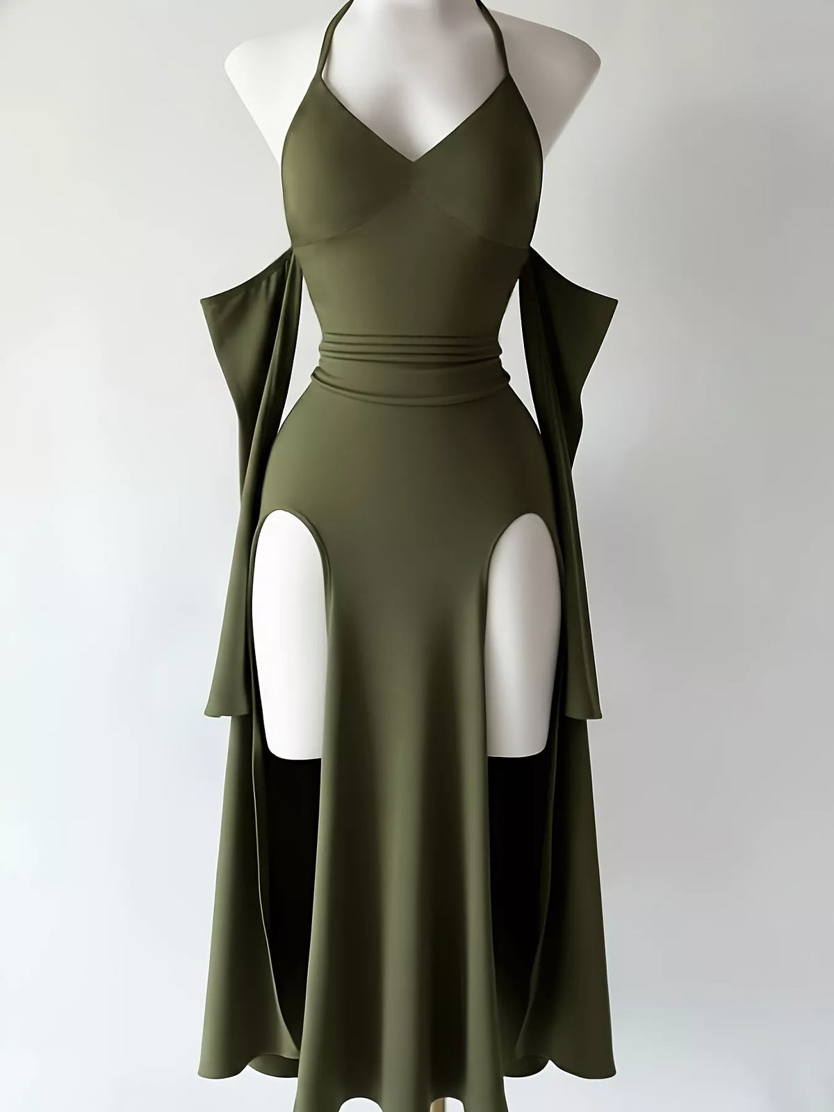 Army-green halter dress with deep V neckline and high side slits