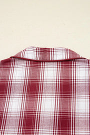 Red plaid pajama shorts shown with shirt, flat lay