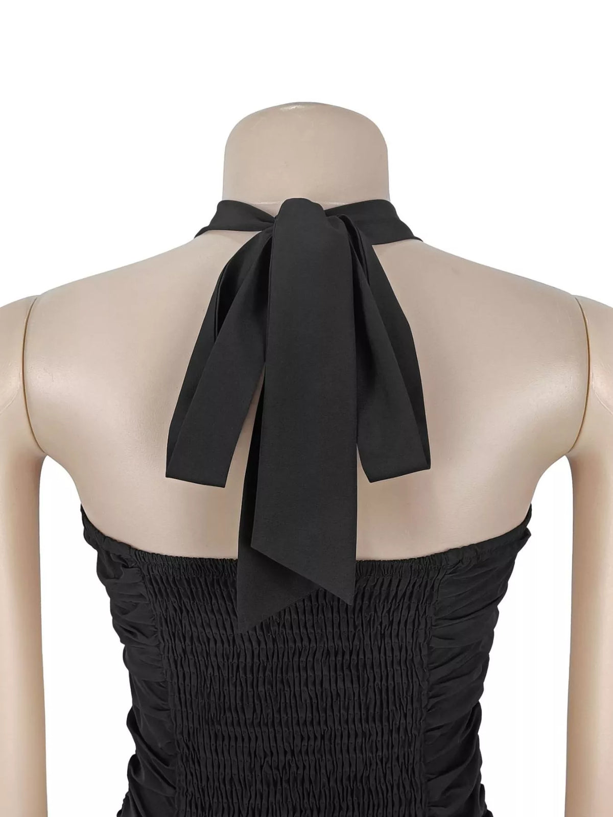 Back neckline and halter tie detail on black dress form