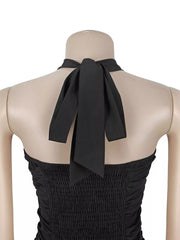 Back neckline and halter tie detail on black dress form