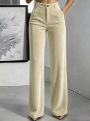 Cream high-waisted velvet trousers with wide legs, belt loops and front pockets, full front view