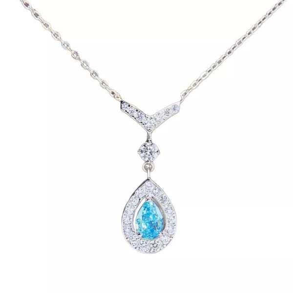 Close-up of the teardrop pendant and its silver-tone chain