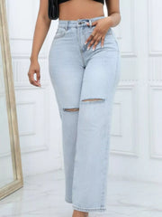 Rear three-quarter view of light-wash wide-leg jeans