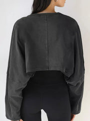 Back view of charcoal cropped sweatshirt with center seam