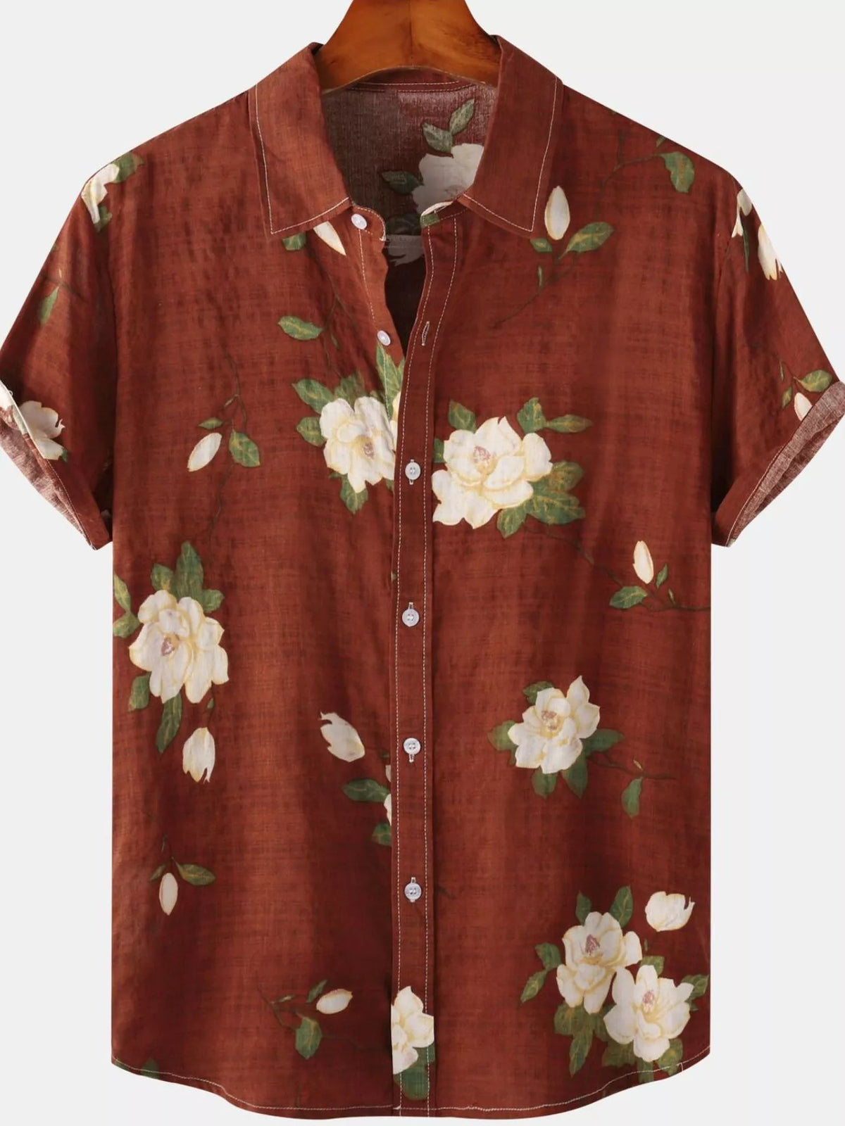 Rust-brown short-sleeve shirt with cream floral print, front view
