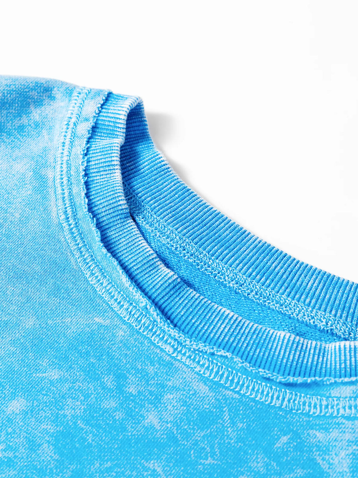 Women's mineral-wash blue raw-seam pocket sweatshirt, close-up of ribbed neckline