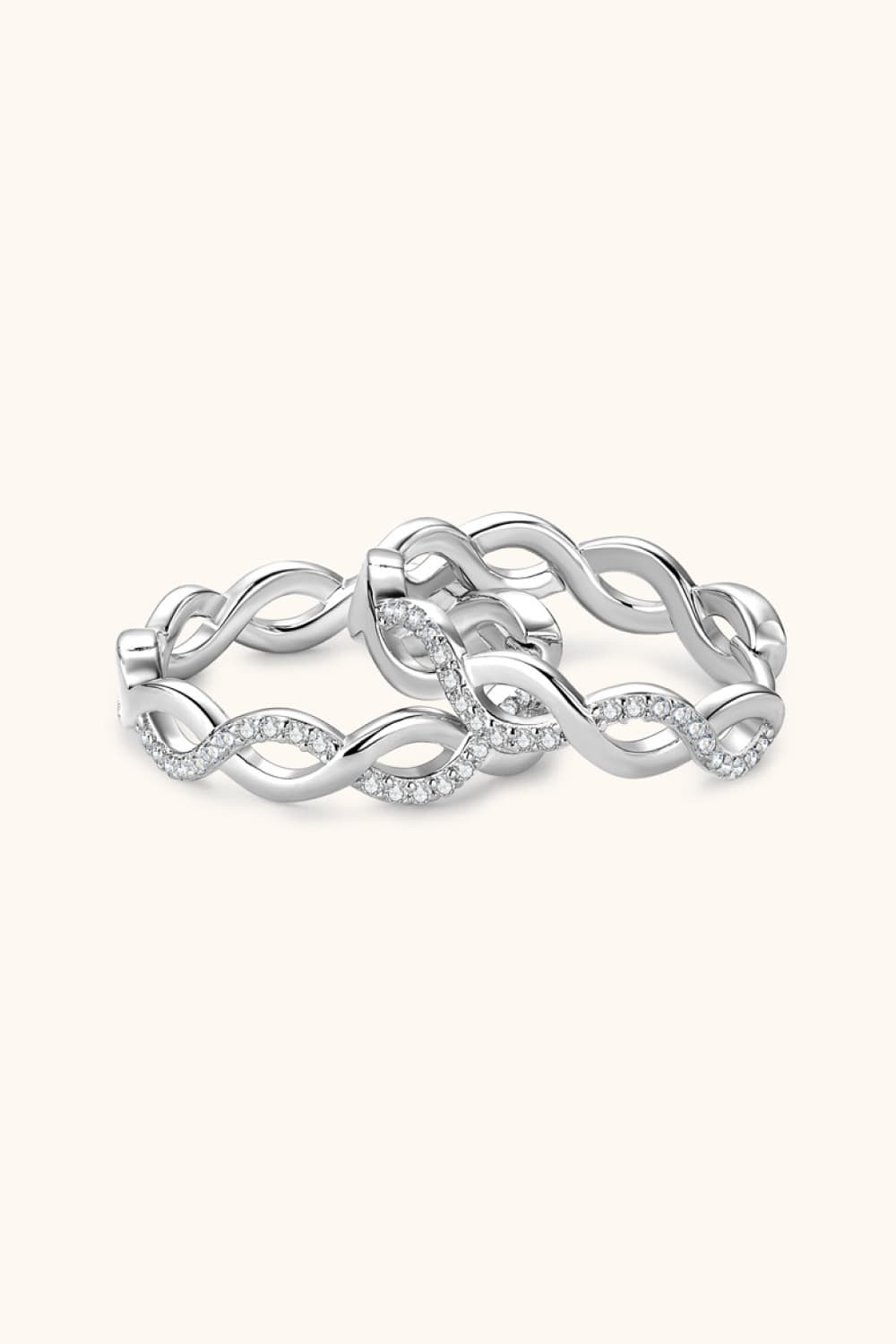 Pair of silver-tone crisscross hoops with clear stone accents