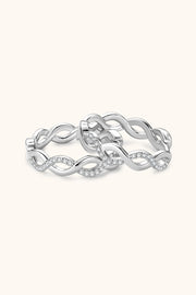 Pair of silver-tone crisscross hoops with clear stone accents