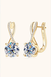 Gold-tone drop earrings with crossed loop tops and round clear stones