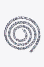 Close view of the silver-tone necklace arranged in a spiral